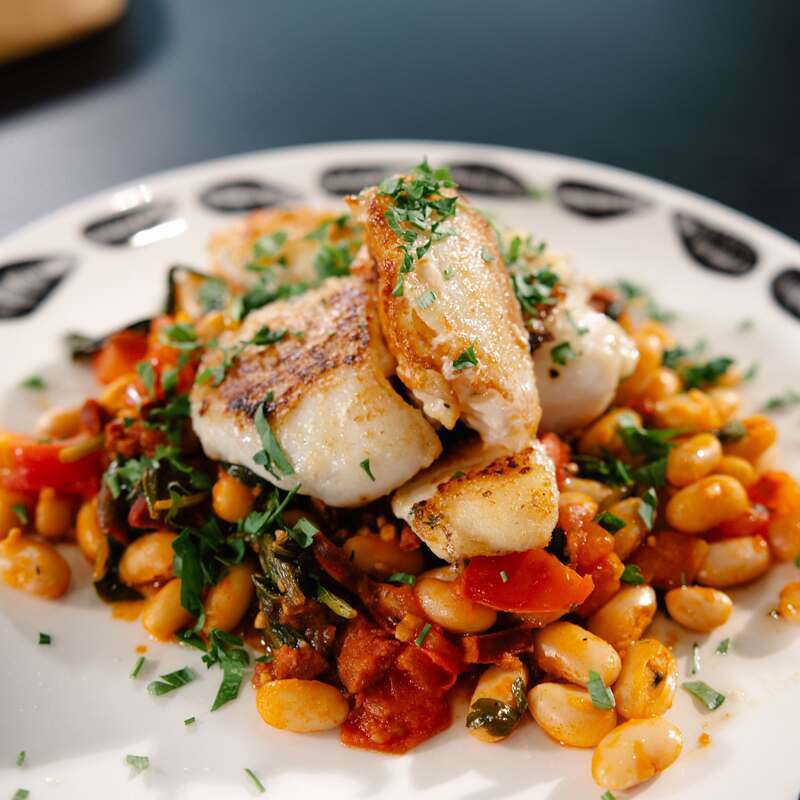 Monkfish Cheeks with White Beans,Tomatoes Spinach and Chorizo